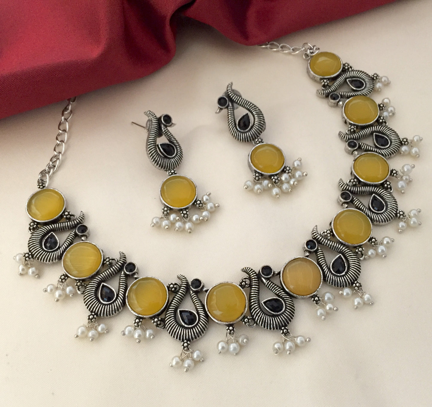 Oxidised yellow necklace with hanging earring monalisa stones