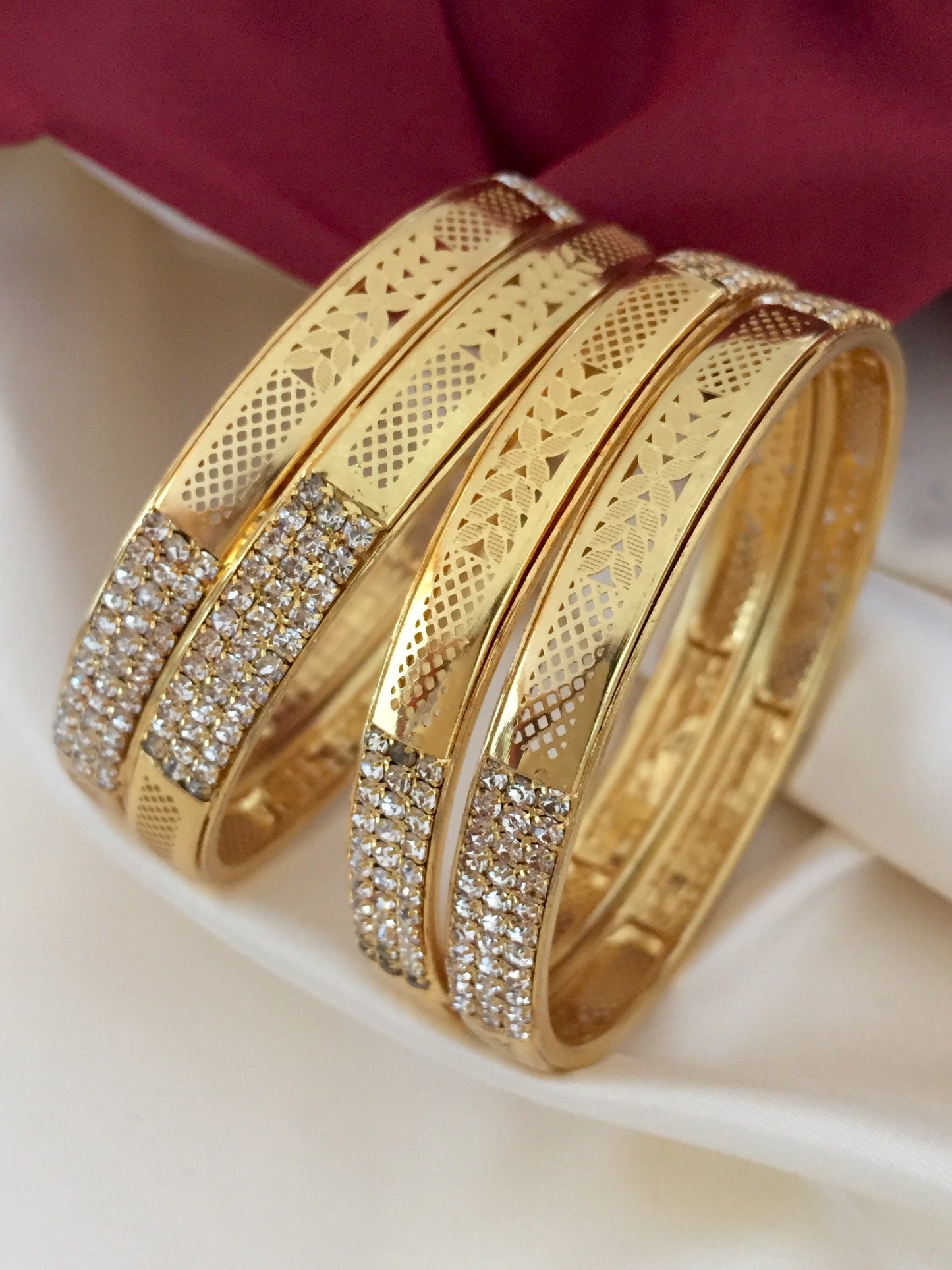 gold look alike American diamond bangles