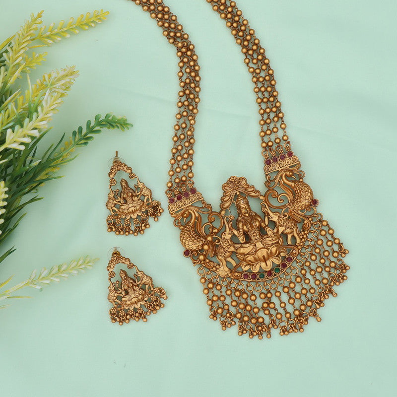 Traditional Temple Lakshmi Haram Set featuring intricate design, accompanied by matching earrings.