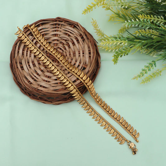 Traditional gold-plated anklets featuring an elegant leaf design, perfect for adding a touch of sophistication to any outfit.