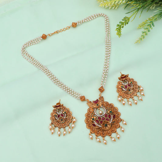 Traditional gold-plated pearl necklace set featuring elegant earrings, perfect for special occasions.